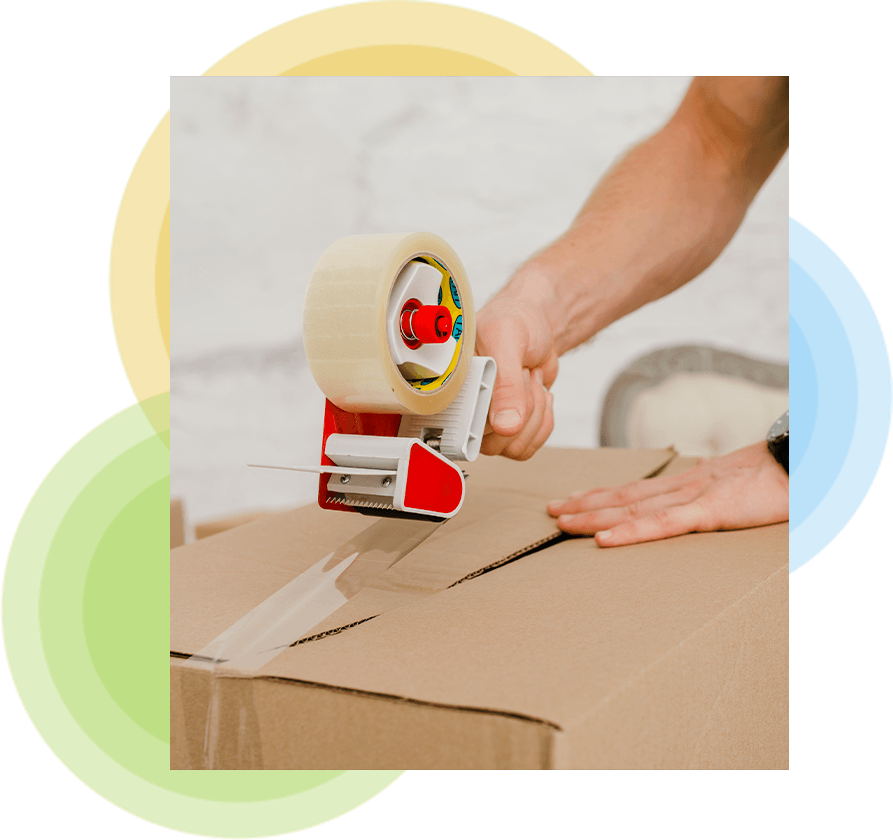 Warehouse worker packaging goods for dispatch